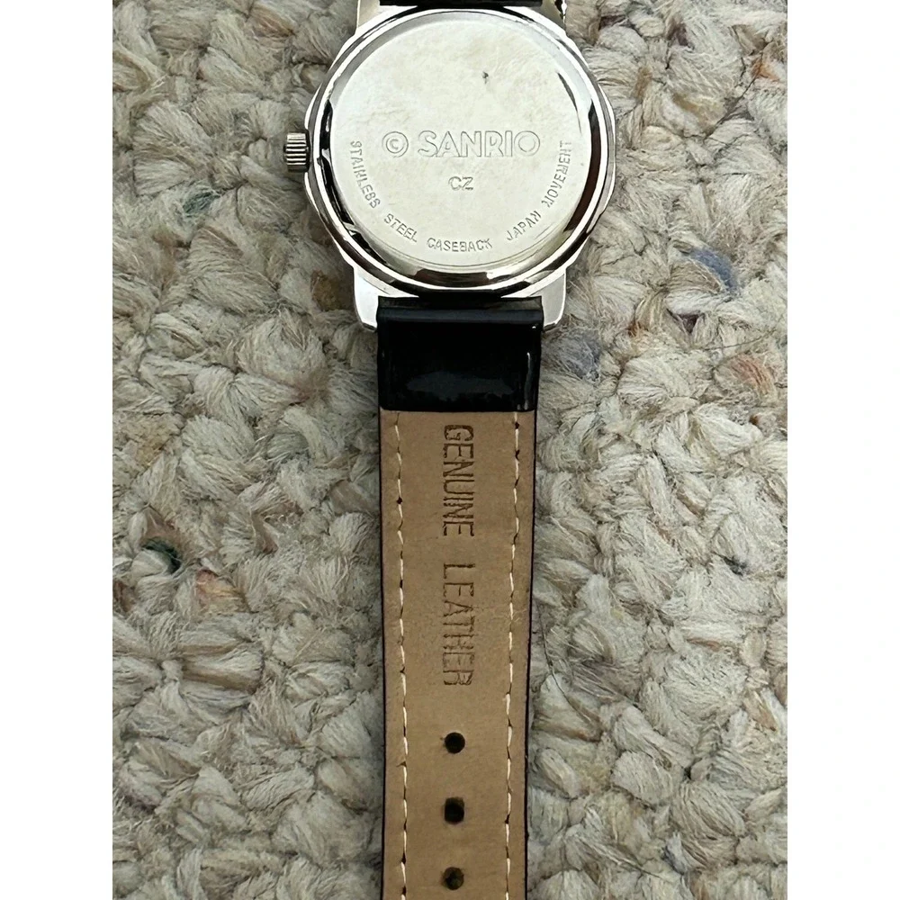 Hello Kitty Women's Watch Silver Tone Rhinestone Bezel‎ Black Band